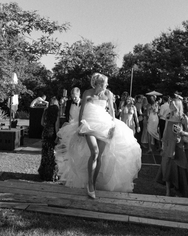 Black and White image of Rudi Ellis Dress and Shoes 