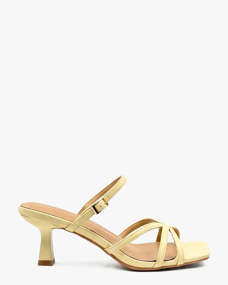 Camellia Strappy Heel in Butter Yellow – crossover toe strap and sculpted flared heel, women's sizes 10–15