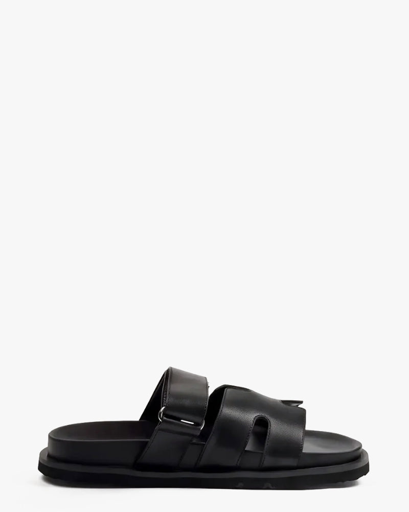 Poppy Slide in Black – cut-out upper with adjustable strap, women's sizes 10–15